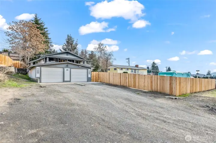 Garage, with additional off street parking. Fenced yard. with gate for vehicle access.