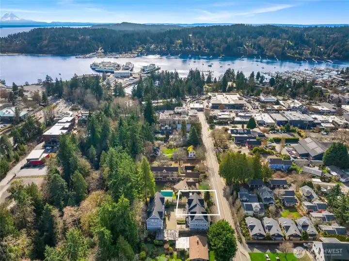 View from above shows Ericksen Avenue facing south toward Winslow with Eagle Harbor in the distance (property boundaries are approximate).