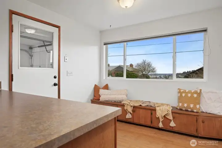 The informal eating area opens to the single car garage.