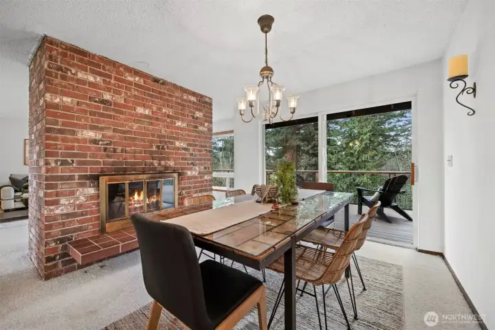 The dining room opens to the very large deck overlooking the spacious rear yard and southerly views and sunsets.