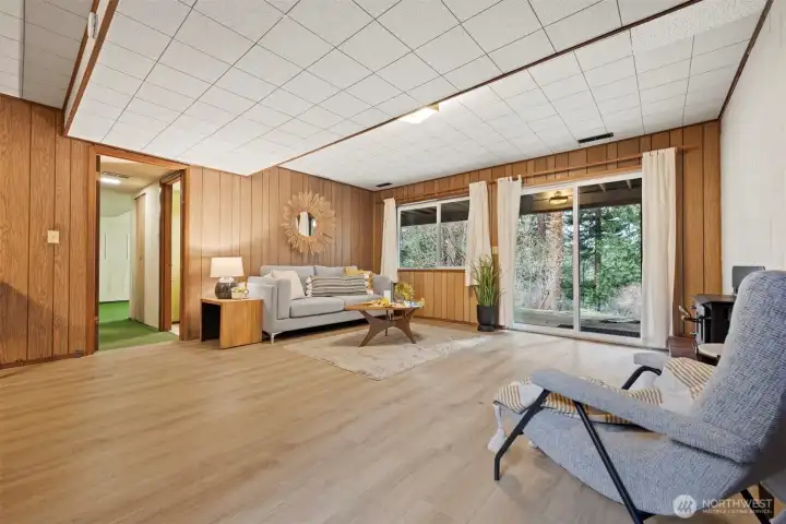 The family room is very large and has a wood burning stove.