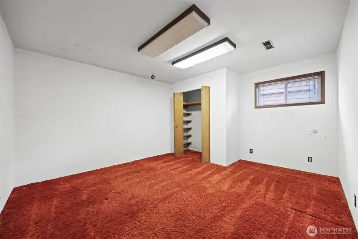 There is a very large 4th bedroom in the lower level adjacent to the bar area.