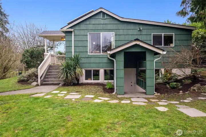 There is entry to the lower level as well, making it ideal for a potential shared living space downstairs.