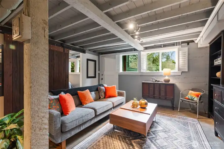 The lower level has that industrial feel with polished concrete floors and exposed beams.