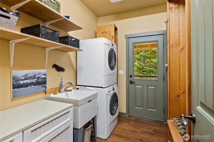 Spacious utility room with plenty of room for laundry, storage, and organization—designed to keep everyday living efficient and clutter-free.
