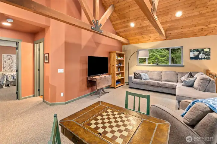 Functional loft space with visual connection to the great room below—well-suited for office use, media space, or quiet retreat.