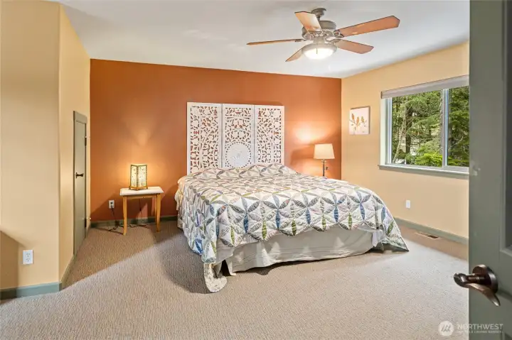 Open and expansive bonus room with endless possibilities for use, from entertainment space to hobby room or secondary living area.