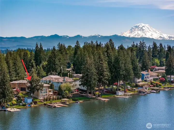 Absolutely stunning no-bank, mostly level Lake Tapps waterfront part of Church Lake Community with 92’ of low-bank frontage and sweeping views of the lake!