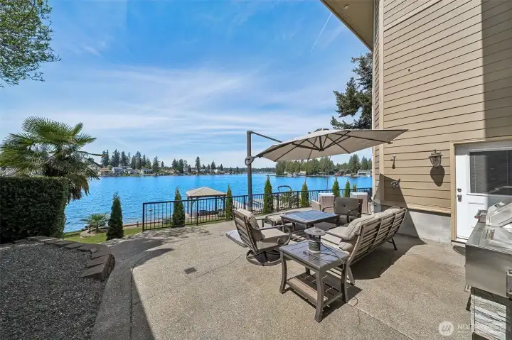 Just off the kitchen is the outdoor BBQ area including outdoor shower.