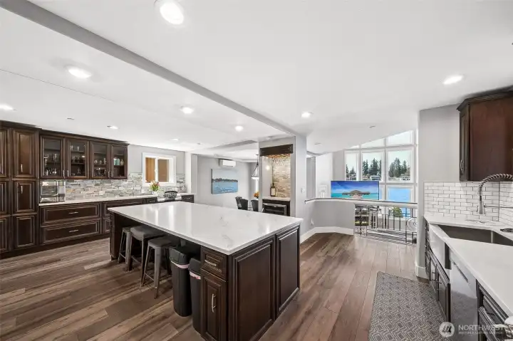 Thoughtfully planned layout offers abundant counter space, quality cabinetry, and seamless flow for cooking and gathering with guests.