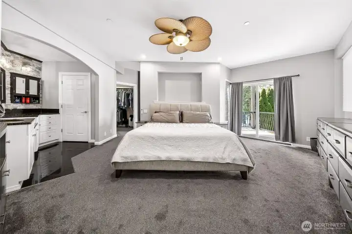 Primary Suite with balcony over looking the lake.