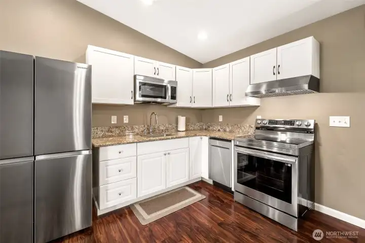 Recently updated upstairs kitchenette NEW cabinets, NEW stove, NEW garbage disposal, NEW microwave, NEW dishwasher, NEW hood & NEW refrigerator! Could be an option for multi-generational living.