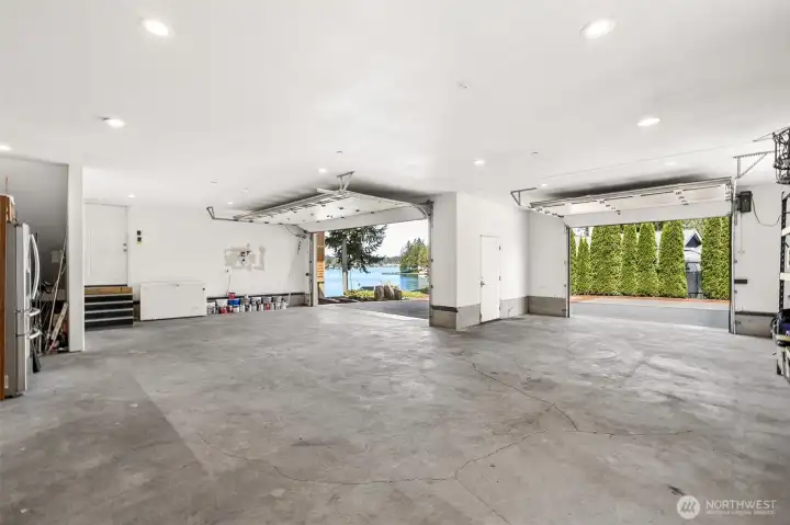 3+ car garage with extra storage cabinets (not in photo). Bring the boat trailers, jet skis, extra cars and still have plenty of driveway parking too.