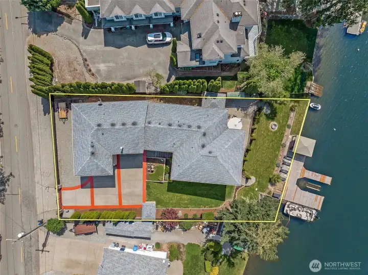 Indulge in lakeside luxury on Lake Tapps' shimmering shores in the coveted Church Lake community.