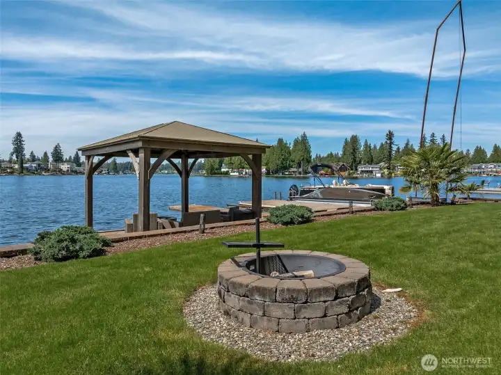 Enjoy a fire by the lake.