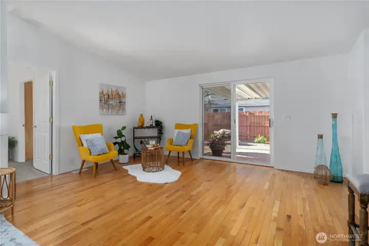 Great room off the kitchen with bar top seating and plenty of room for kitchen table and chairs