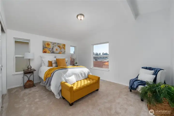 Large primary suite with dual closets and private 5 piece bath