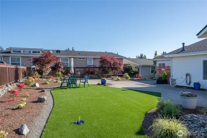 Lovely outdoor gathering space with covered gazebo, BBQ essentials and yard games.