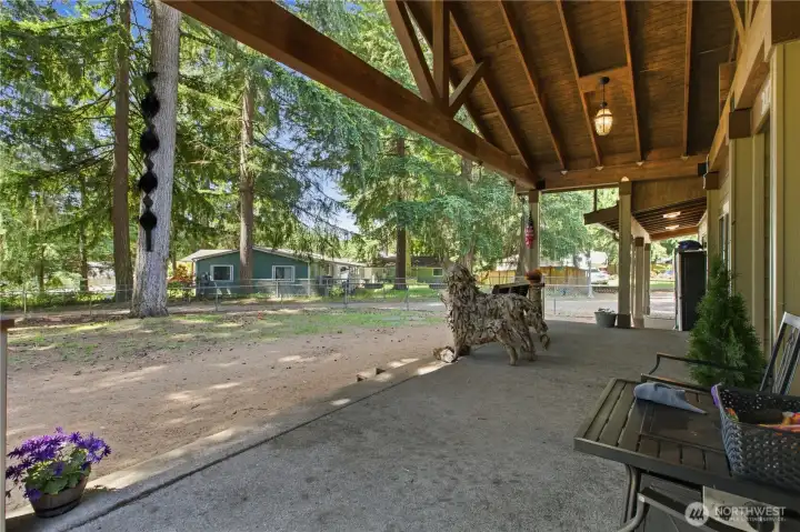 Drink your coffee on the front porch and enjoy the wooded view
