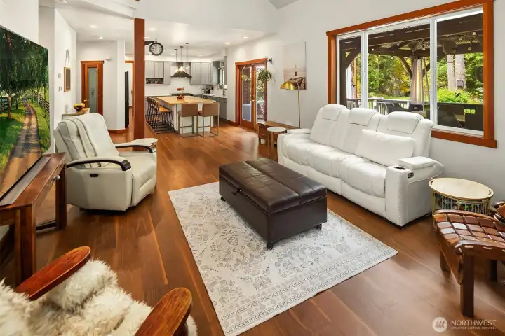 Spacious Family room with a stone faced wood/gas insert.