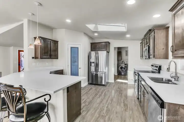 Granite counter, oversized walk-in pantry & all SS appliances.