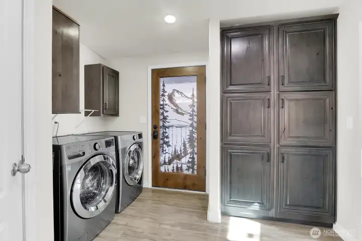 Laundry/storage area with exit to carport. Door is custom made from Frank's Doors in Shoreline.