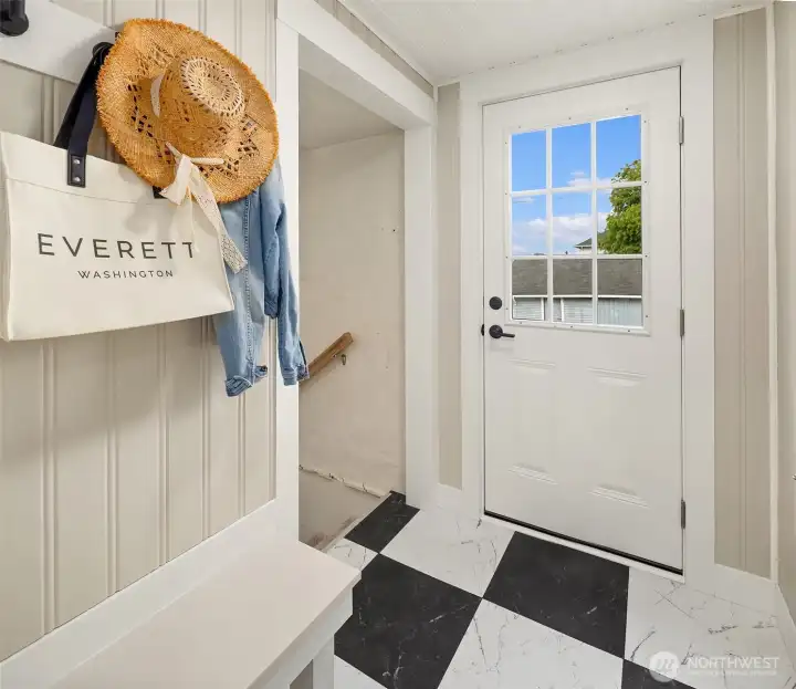 Mudroom and stairs to lower level basement