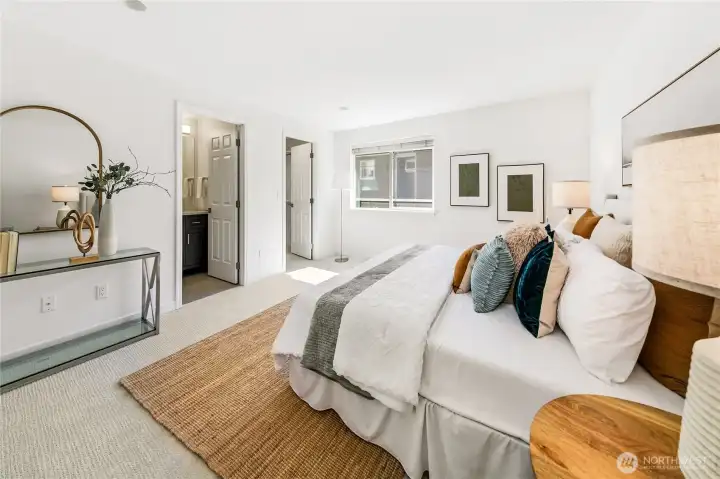 Primary bedroom suite offers calm separation, generous scale and its own internal bath.