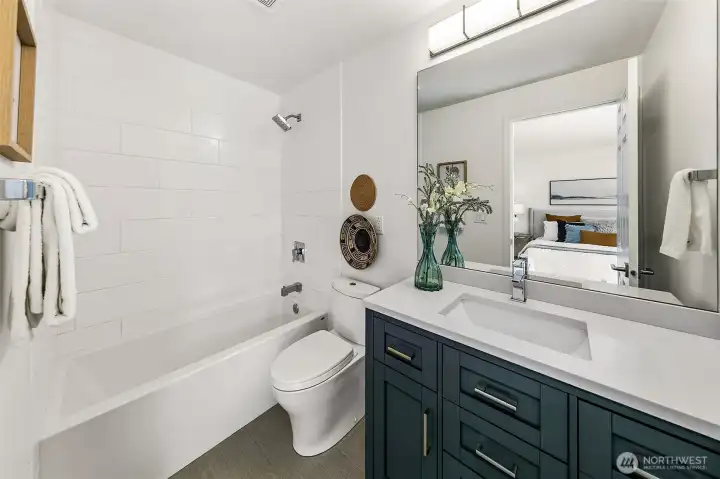 Second bedroom suite has its own bath, giving guests or household members real privacy.