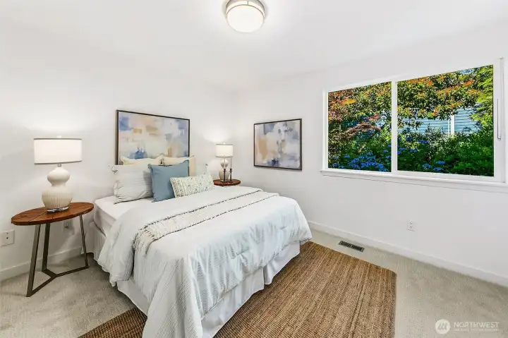 Second bedroom suite has its own bath, giving guests or household members real privacy.