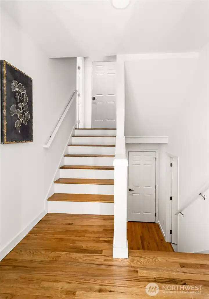 Entry foyer provides direct access to the lower-level bedroom/office, keeping work or guests apart.