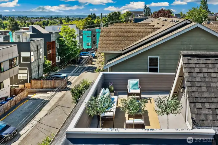 Hilltop siting gives the rooftop terrace exceptional privacy, panoramic views and true outdoor-living utility.