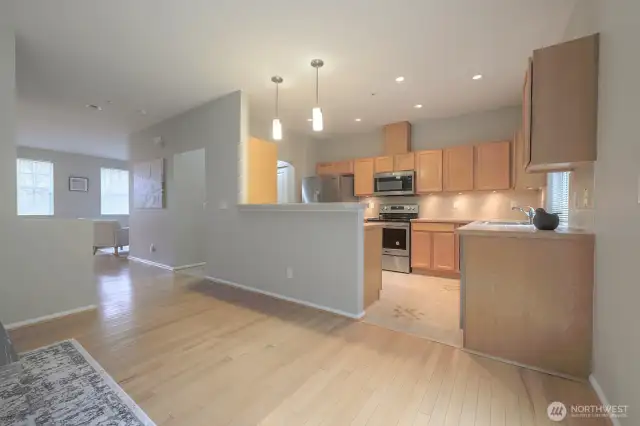 An open-concept layout allows the kitchen to flow naturally into the living and dining areas.