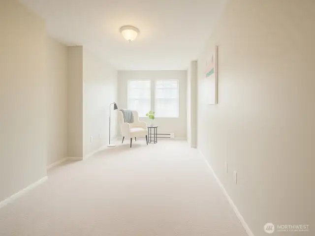 The finished lower level is bright and private, perfect for hobbies, guests, or a media lounge.