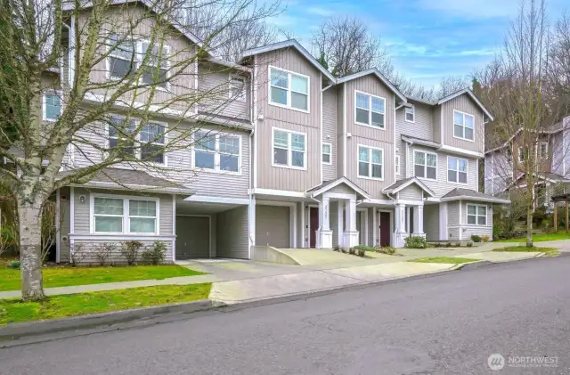 A fresh angle on this corner unit shows its private, light-filled position at the end of the row.