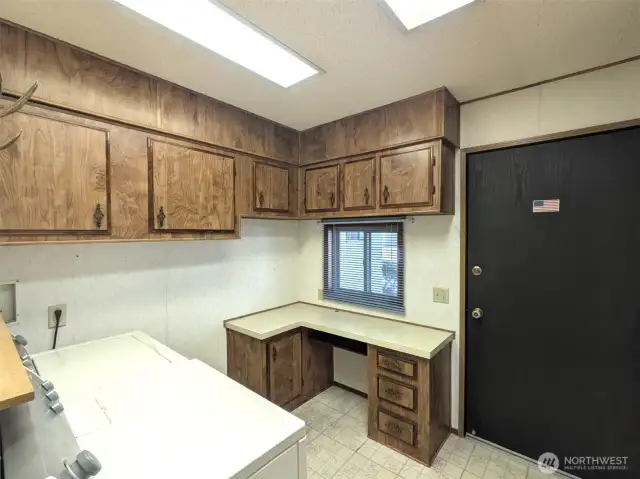 Laundry room with cabinets