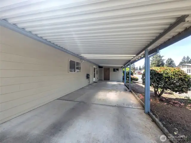 Long driveway with large, heated storage.