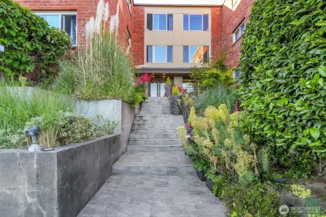 Main entry with mature plantings.