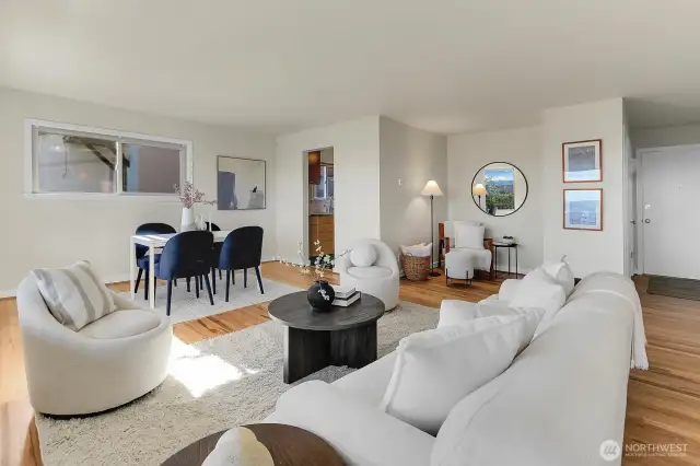So many ways to set up your living space. The nook with the round mirror is another option for your dining area. Some units have opened up the wall into the kitchen here...