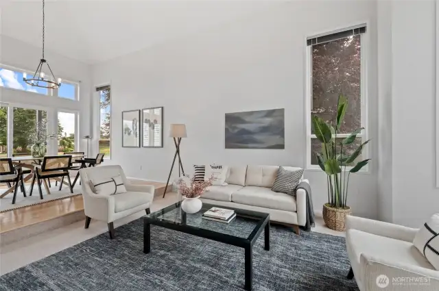 The formal Living Room is filled with natural light.