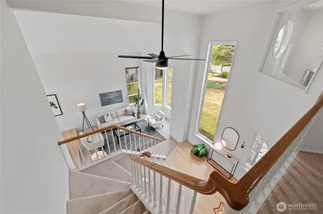 The Grand Staircase leads to the upstairs bedrooms and bathrooms.