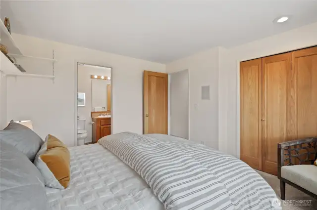 Thoughtfully designed, the second bedroom also includes direct entry to a Jack-and-Jill bathroom that opens to the upstairs hall—an inviting arrangement for guests.