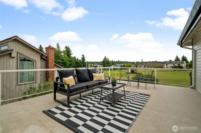 This large private patio is through the Primary Bedroom slider...with beautiful lake and mountain views.