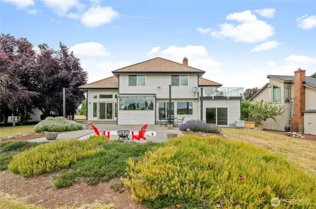 Back view of the house with large patio area.