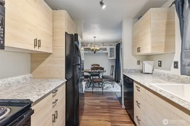 Galley kitchen with lots of natural light on main