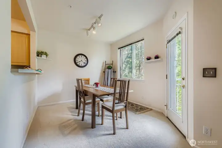 Bright dining room just off the balcony.