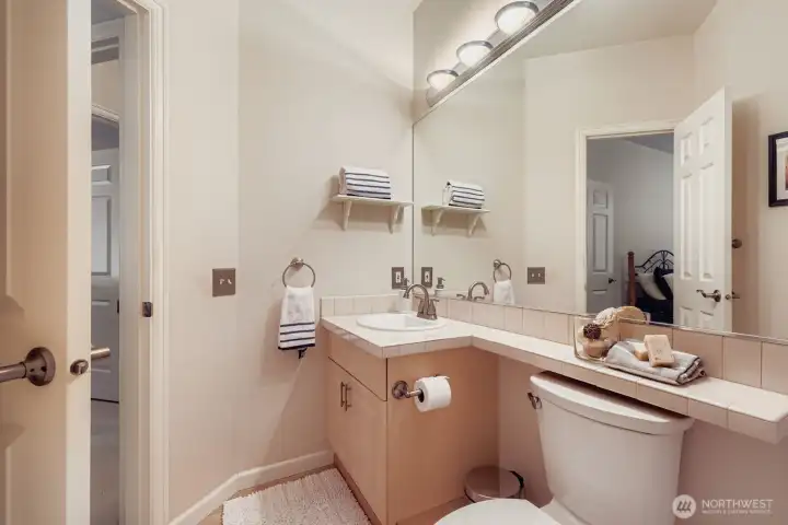 Primary bathroom single sink with extended counter