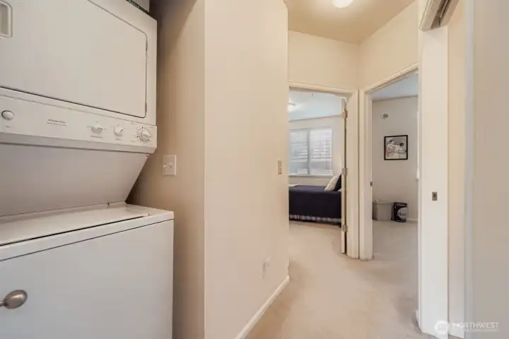 Stack washer and dryer with new ventilation fan.