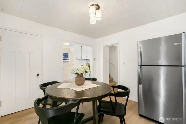 This area fits a larger table and the door to the left is a large pantry/closet!