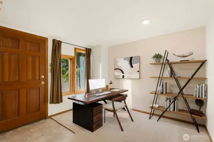 The office has it's own exterior entrance at the front of the house. Perfect spot for WFH or a meeting spot. Virtually staged.